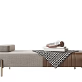 Elegant Beige Brown Living Room Ottoman With Plaid Blanket Stacked Books And Flower Vase