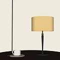 Modern Beige Lampshade Table Lamp With Dark Pole And White Cup On Table 3d model