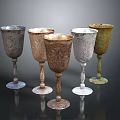 Set Of Colorful Decorative Household Goblets With Intricate Patterns And Metallic Bases