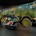Modern Exhibition Hall With Curved Walls Large Screens Showing Fire Scene Trees And Oil Tank