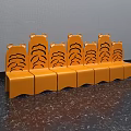 Orange Public Chairs With Tiger Head Design And Striped Backrest In Row