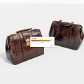 Classic Brown Leather Handbags Featuring Golden Metal Locks And Top Handles