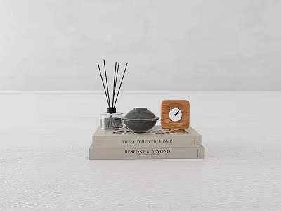 Stack of Detailed Interiors Books with Reed Diffuser Gray Sphere and Wooden Clock 3d model