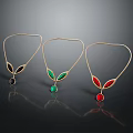 Three Elegant Gold Leaf Design Necklaces With Colored Gemstone Pendants