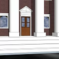 Classic Red Brick Office Building With White Columns Clock On Pediment And Front Steps