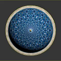 Blue Decorated Dome Building With Intricate Geometric Floral Patterns And White Base Trim