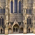 Gothic Church Exterior With Tall Spire Arched Windows And Stone Facade