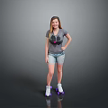 Woman standing in gray t-shirt and denim shorts with purple roller skates on reflective floor