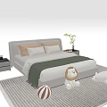 Beige Kids Bed With Plush Lion Seal Striped Ball Pillows Green Blanket And Cozy Rug