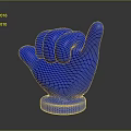 Man Holding Blue Rock Hand Gesture Sculpture With Blue Base