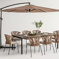 Outdoor Dining Table and Woven Rattan Chairs Set with Patio Umbrella and Potted Plant
