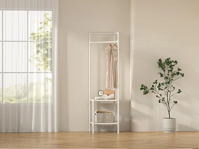 White Standing Clothes Rack With Shelf And Basket Near Window And Green Plant 3d model