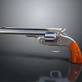 Classic Silver Revolver With Metal Barrel Wooden Grip Reflective Surface And Gray Background