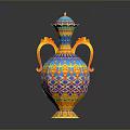 Ornate Carved Vase Sculpture Featuring Blue Orange Decorative Patterns Two Handles And Lid