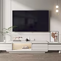 Modern White TV Stand With Storage Drawers And Decorative Items In Living Room