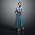 Woman in Blue Denim Dress Holding Cup Against Gray Background Wearing Silver Shoes