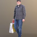 A Man in Plaid Shirt and Blue Jeans Carrying Shopping Bag on Brown Background