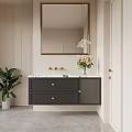 Modern Dark Gray Bathroom Vanity With Gold Faucet Framed Mirror And Green Plant