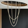 Elegant Multi Layered Crystal Chain Chandelier Hanging From Ceiling Over Black Wall With Wooden Panel