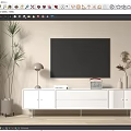 Modern White TV Stand With Flat Screen TV Table Lamp And Decorative Plants