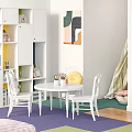 White Round Children's Table with Chairs Colorful Bookshelf and Abstract Painting on Purple Green Rug
