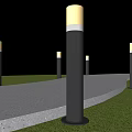 Outdoor Pillar Lights Illuminating Night Pathway And Lush Green Grass Area