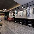Modern Clothing Store with Bright Lighting Clothing Racks Counter and Greenery Decor
