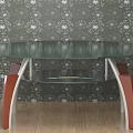 Round Green Glass Table With Red Silver Legs On Wooden Floor Against Patterned Wallpaper