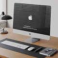 iMac Desktop Computer on Wooden Desk with Keyboard Mouse Desk Lamp Notebook and Eyeglasses
