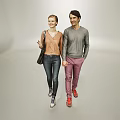 Man And Woman Walking Hand In Hand In Casual Outfits On Gray Background