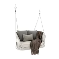 Cozy Wicker Hanging Chair With Gray Cushions And Brown Throw Blanket Design