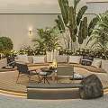 Modern Outdoor Sofa On Wooden Deck With Fire Pit Green Plants And Cozy Cushions