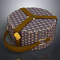 Round Patterned Clothing Storage Bag With Brown Straps Gold Buckles And Handheld Design