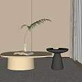 Modern Minimalist Light And Dark Circular Coffee Tables With Open Book Glass Vase Green Plant