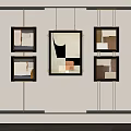 Modern Abstract Art Paintings In Black Frames On Light Colored Wall