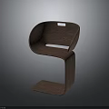 Unique Modern Wooden Chair Featuring Curved Design And Sleek Minimalist Structure