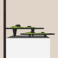 Modern Green Moss Bonsai Display On Black Trays And White Pedestal