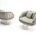 Modern Luxury Single Sofa with Rattan Material Light Colored Cushions and White Base 3d model