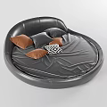 Black Leather Round Bed With Brown Black And Patterned Pillows Modern Bedroom Design