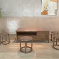 Modern Wooden Coffee Table With Round Stools Abstract Painting Potted Plant And Floor Lamp