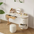 Modern White Wooden Dressing Table With Round Mirror Cosmetics Drawers White Stool And Green Plant