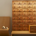 Wooden Storage Cabinet With Multiple Drawers And Open Book On Side