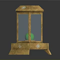 Ornate Golden Lantern Shaped Display Case With Green Orb And Decorative Base