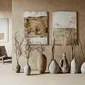 Ceramic Vessels Displayed In Neutral Toned Interior With Artworks And Dried Branches