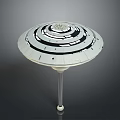 Disc Shaped Circular Structure With Central Pillar And Concentric Rings