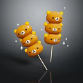 Yellow Bear Head Shaped Sweet Treats Skewered on Sticks with Star Decorations