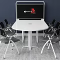 Round White Conference Table With Black Chairs And Large Screen On Blue Wall 3d model