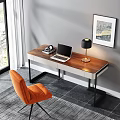 Modern Wooden Desk With Laptop Table Lamp And Orange Chair In Natural Light