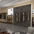 Elegant Modern Clothing Store Interior With Hanging Clothes Display Racks And Sofa