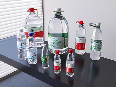 Various Bottled Water Drinks With Different Sizes And Brands Displayed On Black Table 3d model